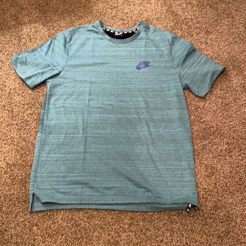 Teal medium Nike t-shirt.